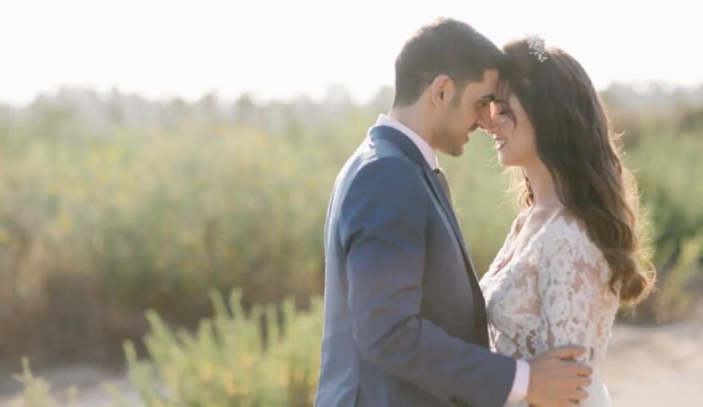 Circus fair wedding couple under the Sun